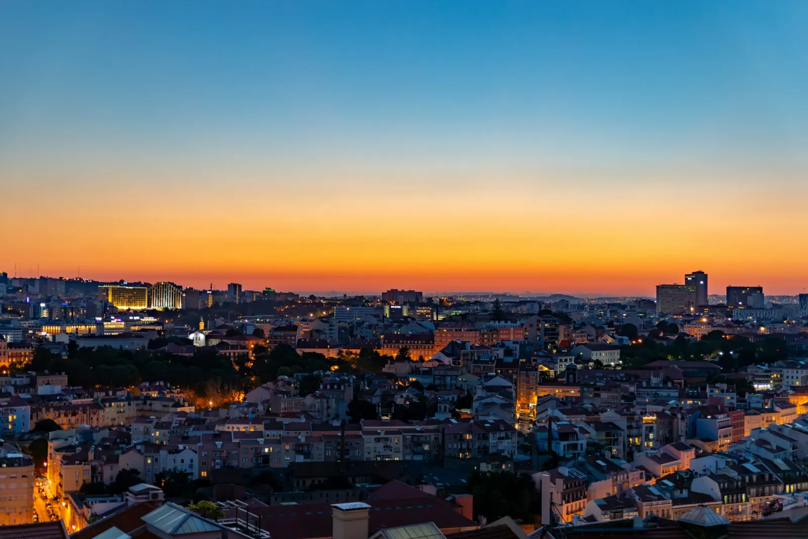 Lisbon at sunset seen from a hill