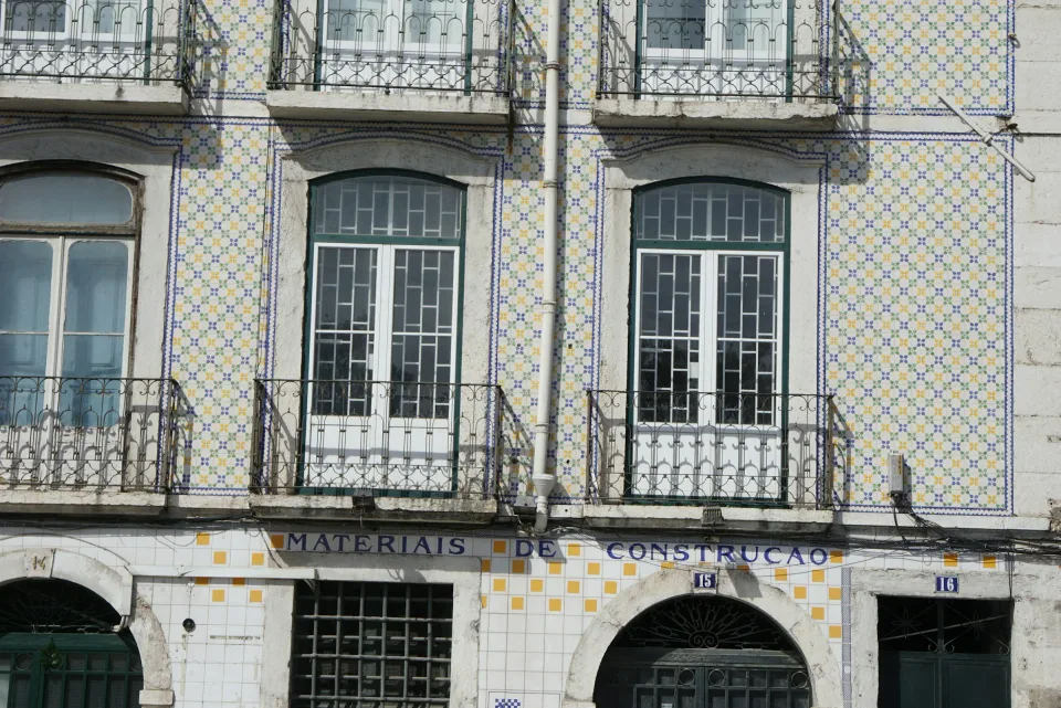 Tiled residential building with iron balconies in Lisbon